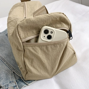 Large capacity beige nylon shoulder bag with side zipper pocket for phone storage