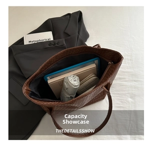 Interior view of large woven tote bag showing spacious capacity for daily essentials