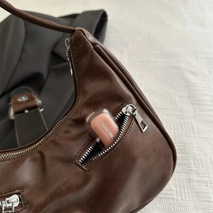 Brown vintage half-moon crossbody bag with large capacity and side zipper pocket