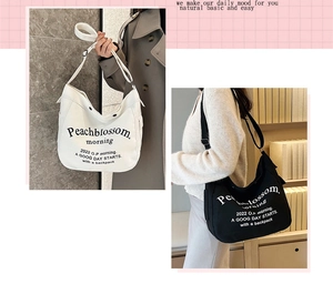 Detail of canvas crossbody bag with Peachblossom lettering and adjustable strap