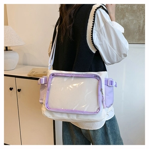 Detail of purple canvas ita bag with clear PVC window and adjustable buckle strap
