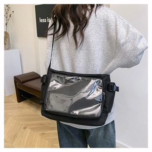 Black canvas messenger bag with large clear PVC window and adjustable straps for daily use