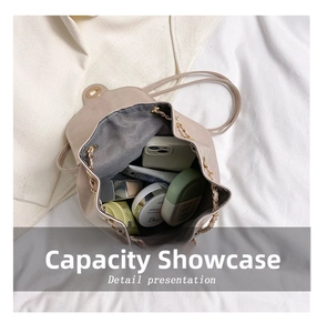 Top view detail of the beige drawstring backpack showing spacious inner storage capacity