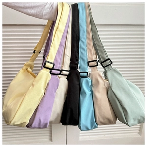 Corduroy crossbody bags in seven colors with adjustable straps and zipper closure