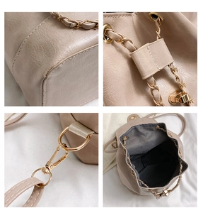 Detailed views of beige leather backpack featuring chain accents and gold metal buckles