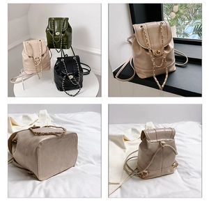 Detail of mini chain backpack showing turn-lock closure, drawstring and multiple colors