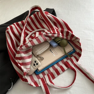 Red and white striped canvas tote bag with large capacity for daily essentials