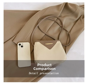 Detailed size comparison of a beige leather bucket bag next to a white smartphone
