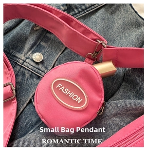 Mini portamonete rosa in nylon con logo FASHION e moschettone in argento
