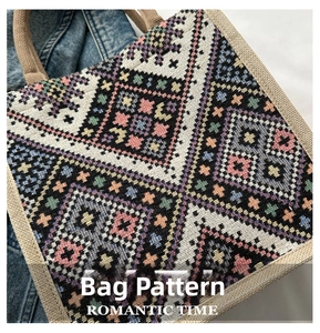 Close-up detail of colorful ethnic geometric woven pattern on a stylish tote bag