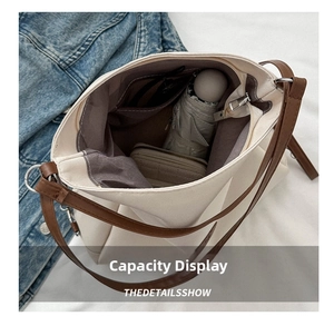 Detail view of canvas tote interior showing spacious storage for daily essentials