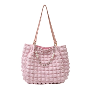 Pink quilted tote bag with bubble texture and decorative pearl flower chain for women