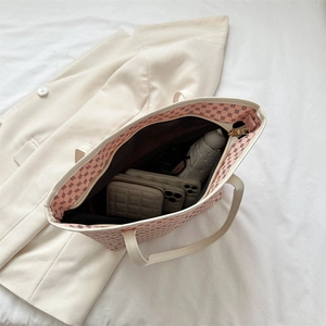 Pink monogram tote bag with large capacity showing spacious interior for essentials