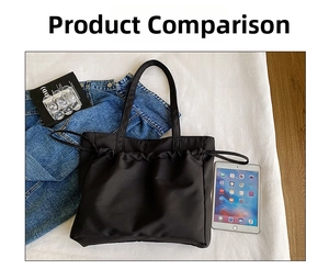 Detailed top view of black knit tote bag showing spacious capacity for a tablet device