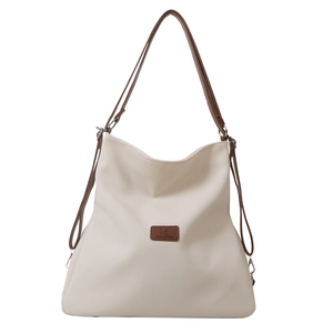 Minimalist off-white large capacity tote bag with brown straps and center logo detail
