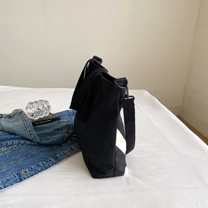 Sac fourre-tout en toile noire à rayures blanches, poignées et bandoulière réglable