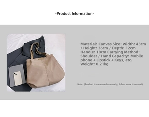 Detail view of khaki canvas tote bag showing dimensions 43x36x12cm and shoulder strap length