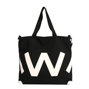 Sac fourre-tout noir minimaliste en toile avec grand W blanc et poignées