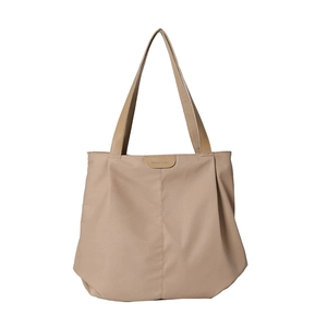 Large capacity khaki canvas tote bag with leather buckle in a modern minimalist style