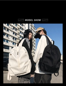 Outdoor model display of black and white minimalist nylon backpacks for couples