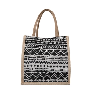 Ethnic tote bag with black and white geometric patterns and woven handles