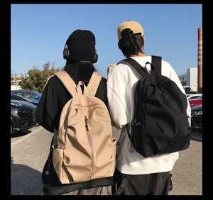 Outdoor shot of minimalist large-capacity backpacks in khaki and black for daily use
