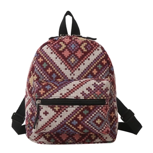 Minimalist vintage ethnic backpack with colorful geometric jacquard patterns and black straps