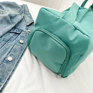 Sac de voyage sport vert menthe imperméable à grand compartiment et poche latérale