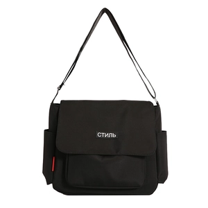 Minimalist black messenger bag with white lettering and adjustable strap for students