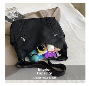 Large capacity tote bag showing internal storage for umbrella, sunglasses and phone