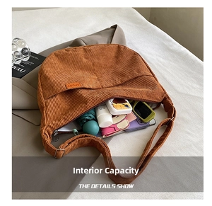 Brown corduroy hobo bag showing large interior capacity for daily essentials and umbrella