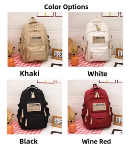 Confronto dettagliato di quattro colori di zaini: kaki, bianco, nero e rosso vino