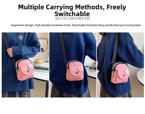 Pink canvas crossbody bag featuring adjustable black strap and round cartoon badge detail