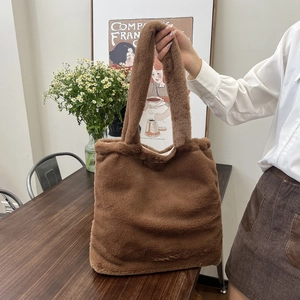 Minimalist soft faux fur tote bag in caramel brown for winter everyday shoulder wear