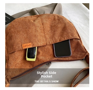 Detailed view of brown corduroy bag with a practical front pocket and sport label
