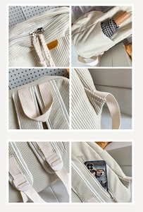 Detail view of corduroy backpack featuring dual zippers, side pocket and anti-theft back pocket