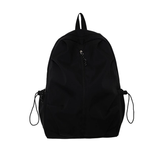 Minimalist black lightweight travel backpack with waterproof zipper for students and commute