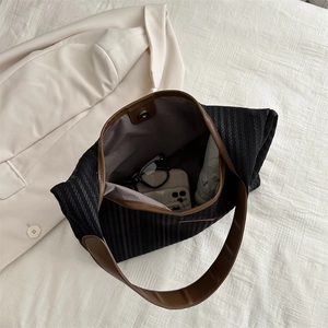 Large capacity striped canvas tote bag with brown faux leather straps for daily commute