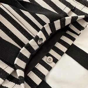 Minimalist black and white striped canvas tote bag with magnetic closure for women