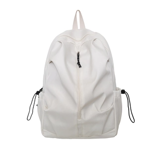 Minimalist beige backpack with large capacity and vertical front zipper for travel