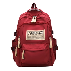 Zaino capiente in nylon rosso scuro con tasche multiple e tessuto impermeabile lucido