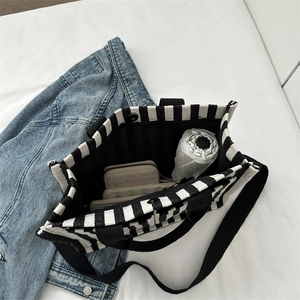 Large capacity striped canvas tote bag with black handles and shoulder strap