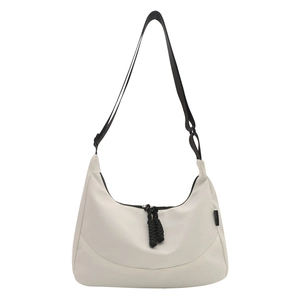 Cream white waterproof nylon hobo bag with black adjustable strap and woven rope zipper
