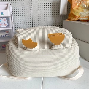 Cute off-white corduroy mini backpack with yellow accents and fashion patch for women