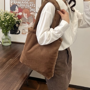 Brown faux fur tote bag for women showing a stylish soft shoulder bag in autumn style