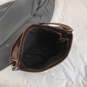 Brown vintage large capacity tote bag with spacious interior and gold-tone hardware