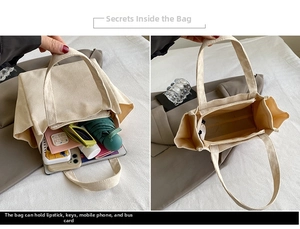Detail of spacious beige corduroy tote interior showing the zipper pocket and capacity