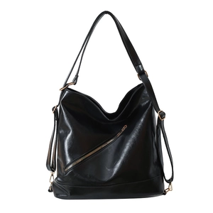 Glossy black PU leather hobo bag with gold hardware and diagonal zipper detail