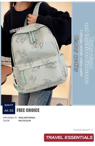 Detail of light green butterfly print backpack with dual woven rope zipper pulls