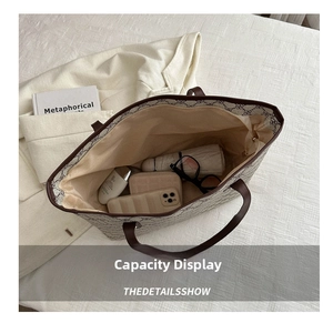 Top view of large tote bag interior showing spacious capacity with personal items